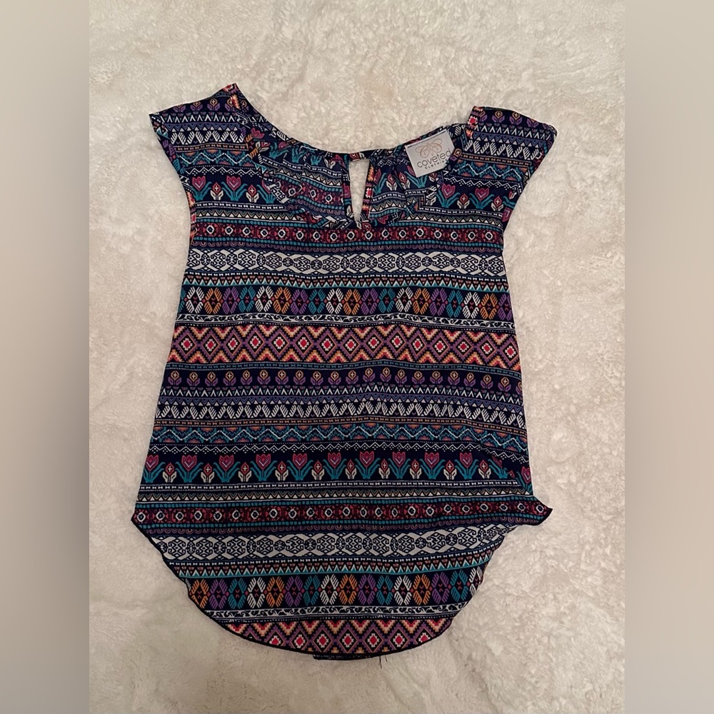 Cute flowy shirt with colorful designs, rarely worn, and size small.